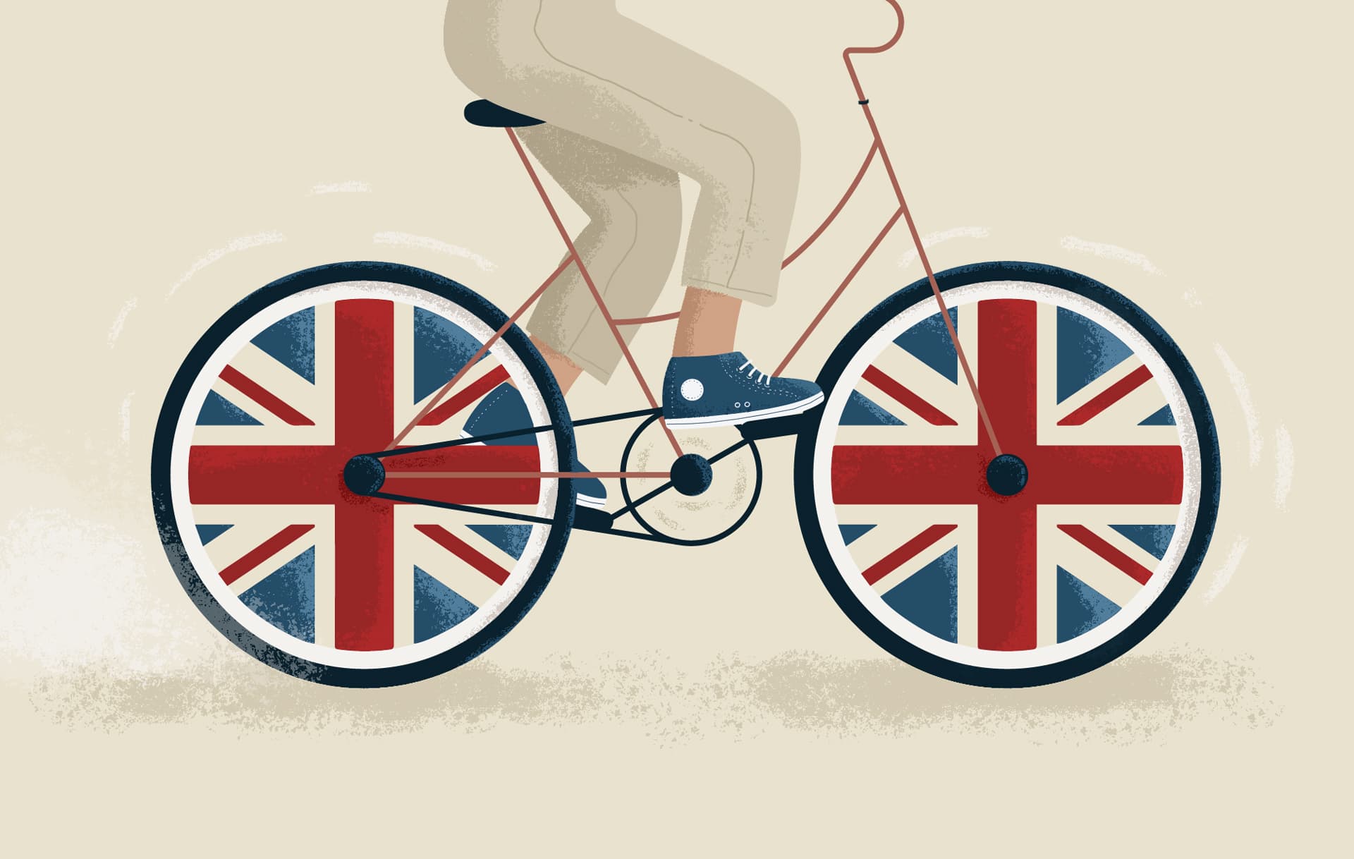 A cyclist in London, England, with the Union Jack in their wheels