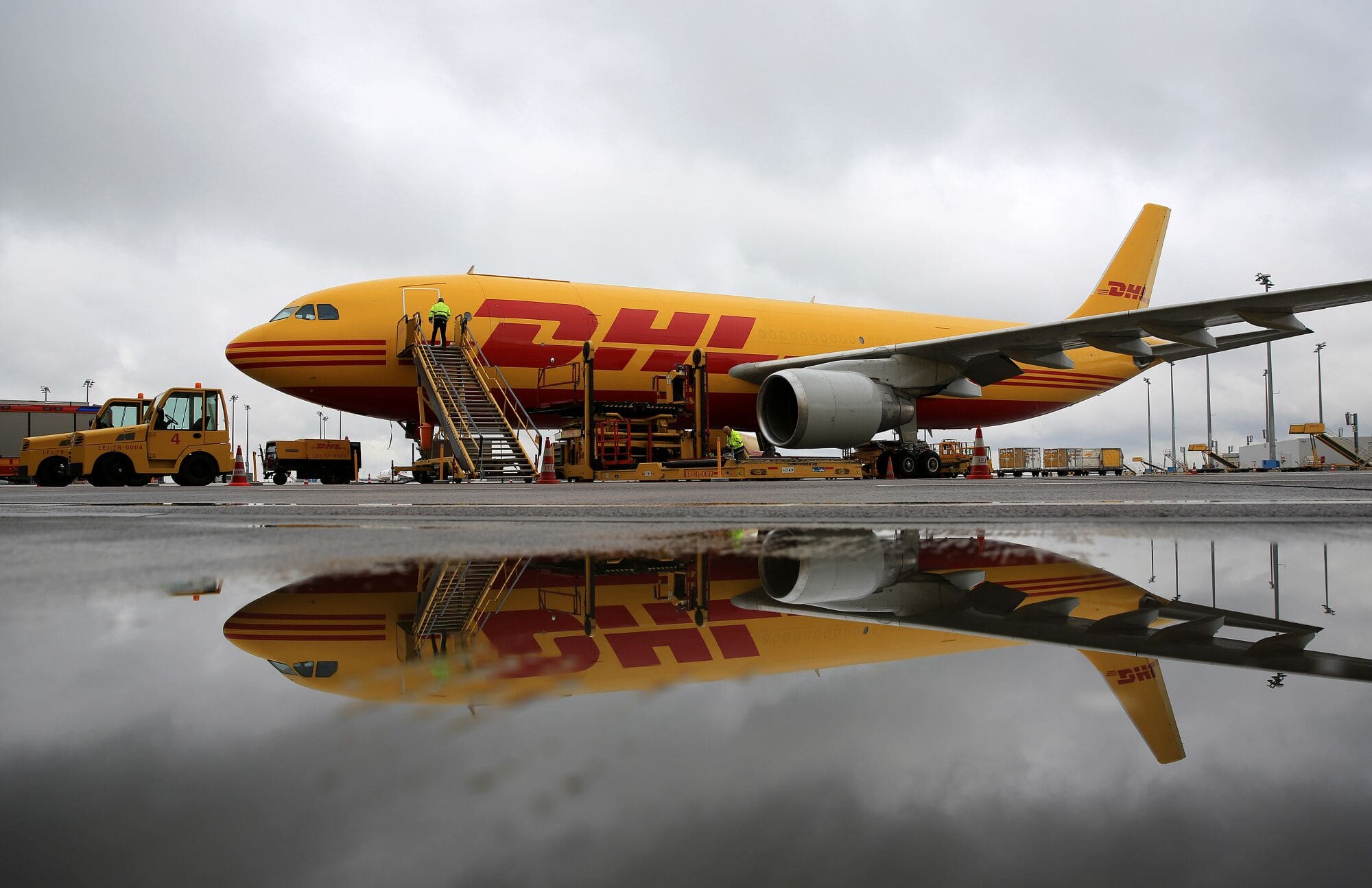 A photo of a plane operated by DHL, which is leading the world in the shift to sustainable aviation fuels.