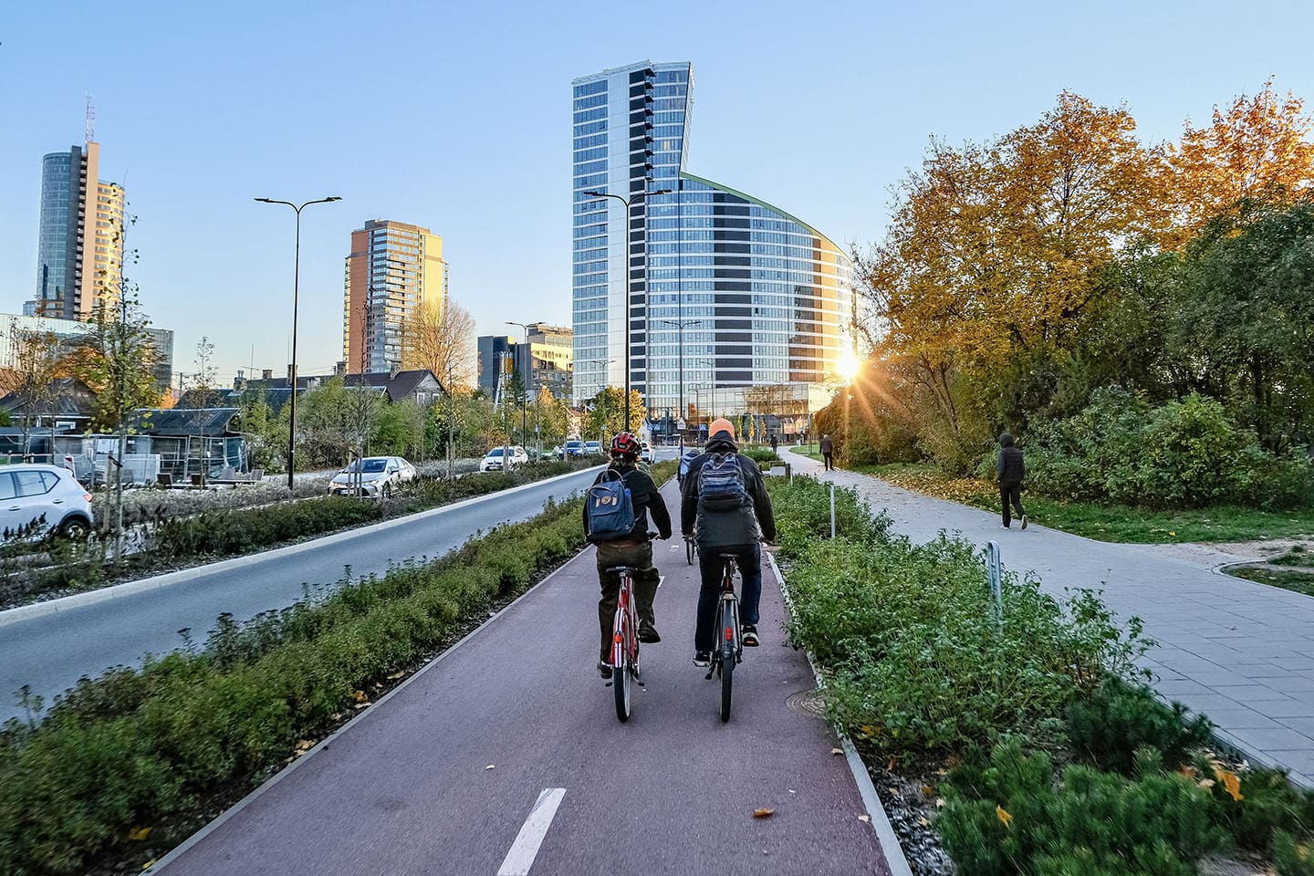 A photo of cyclists using a dedicated cycling path in Vilnius, Lithuania, which is making great strides in sustainable urban mobility.