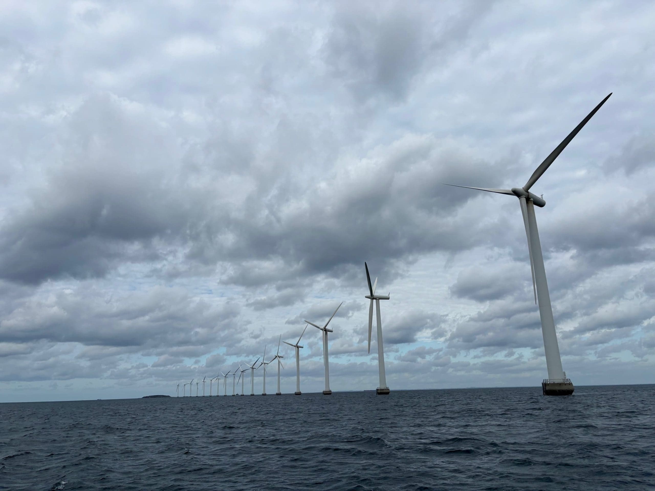A photo of a wind farm off the coast of Copenhagen, Denmark.
